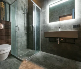 Bathroom Remodel - This bathroom is mostly brown with backlighting and a simple feel